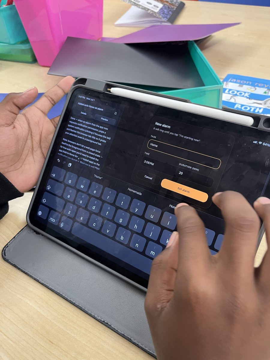 A student setting up an app on a tablet